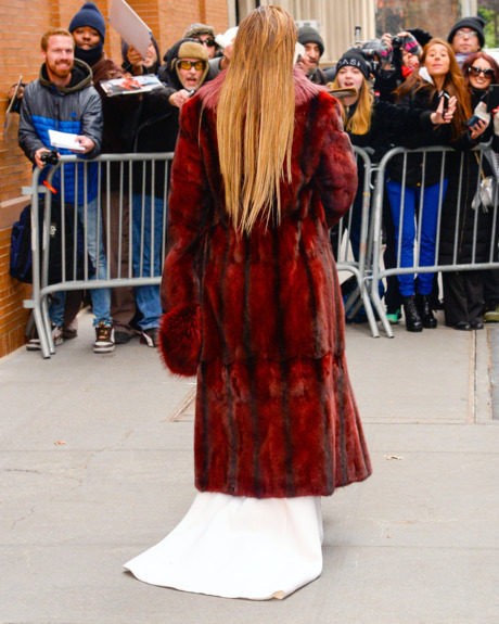 Jennifer Lopez wears Stephane Rolland pants with train