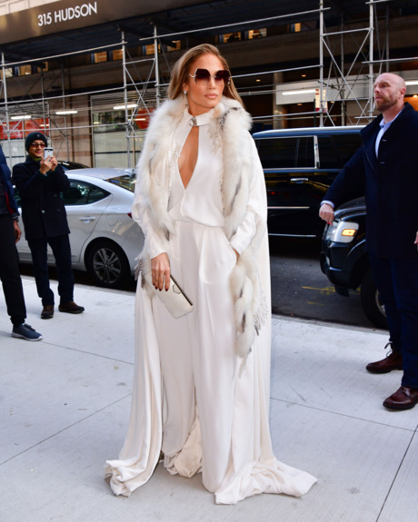 Jennifer Lopez in a white coat