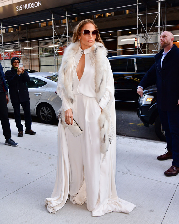 Jennifer Lopez in a white coat
