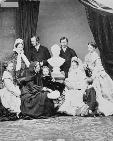 Queen Victoria and her children, with a bust of Prince Albert, two years after his death.