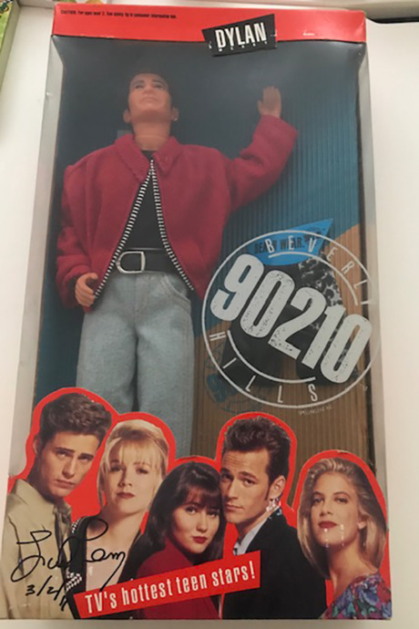 The signed Dylan McKay doll.