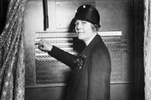 09 Oct 1928 --- Original caption: 10/9/1928- New York, NY- Women Candidate for Congress Shows How to Use the Voting Machine. An added attraction of the campaign waged by the Republicans in the present election is the school in New York City, where voters are instructed in the art of using the voting machine. Photo shows Mrs. Ruth Pratt, Republican Candidate for Congress from New York, showing how the machine works. --- Image by © Bettmann/CORBIS