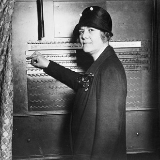 09 Oct 1928 --- Original caption: 10/9/1928- New York, NY- Women Candidate for Congress Shows How to Use the Voting Machine. An added attraction of the campaign waged by the Republicans in the present election is the school in New York City, where voters are instructed in the art of using the voting machine. Photo shows Mrs. Ruth Pratt, Republican Candidate for Congress from New York, showing how the machine works. --- Image by © Bettmann/CORBIS
