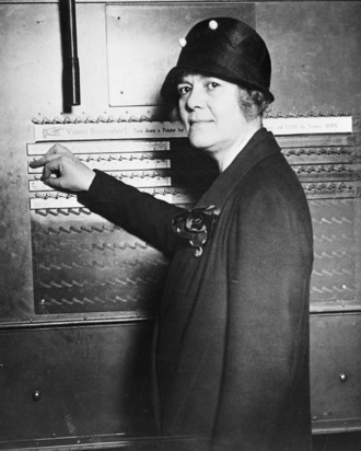09 Oct 1928 --- Original caption: 10/9/1928- New York, NY- Women Candidate for Congress Shows How to Use the Voting Machine. An added attraction of the campaign waged by the Republicans in the present election is the school in New York City, where voters are instructed in the art of using the voting machine. Photo shows Mrs. Ruth Pratt, Republican Candidate for Congress from New York, showing how the machine works. --- Image by © Bettmann/CORBIS