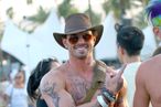 Kellan Lutz shows off his toned body and tattoos at coachella
